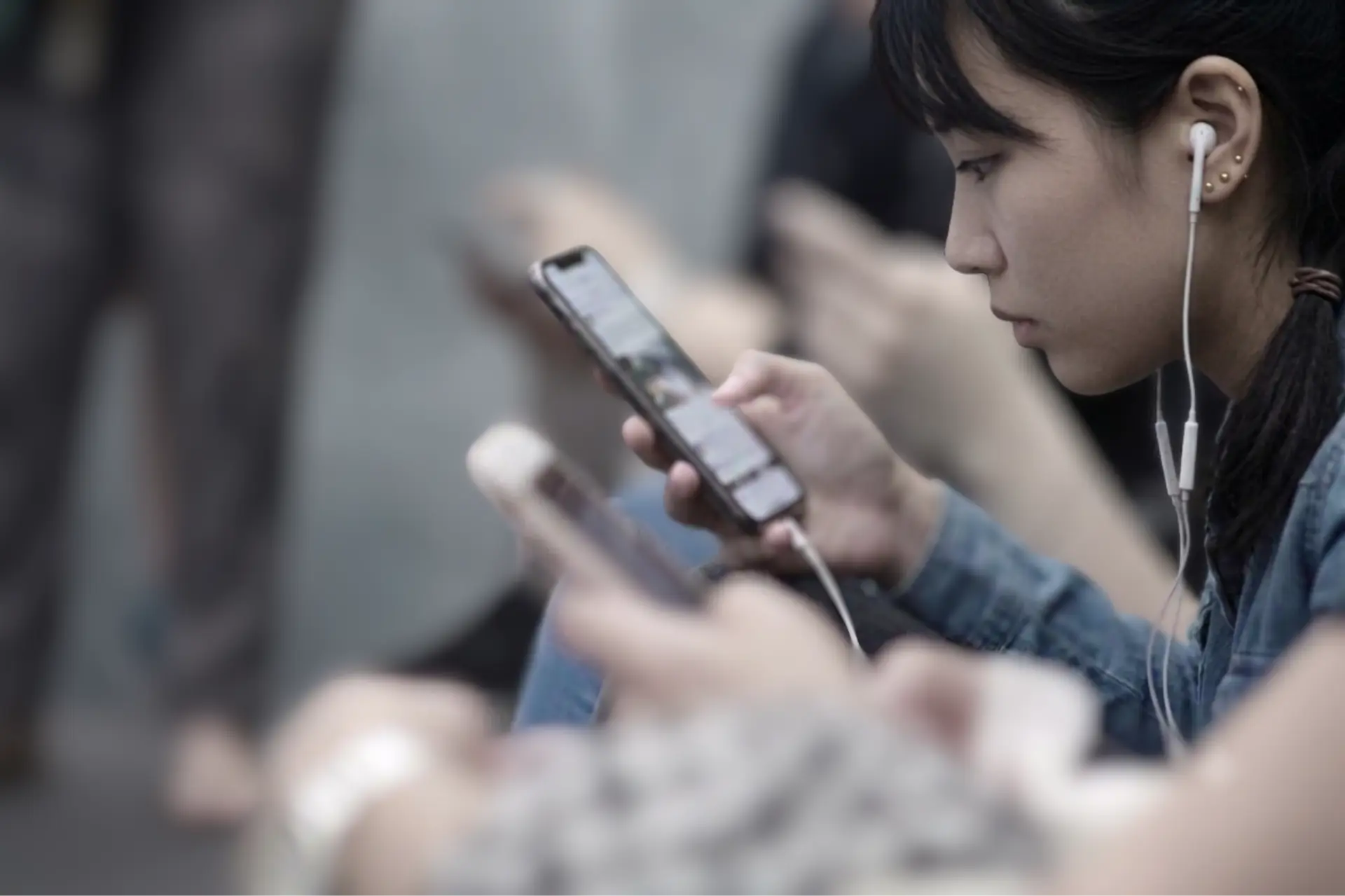 People using a prototype app on their phones